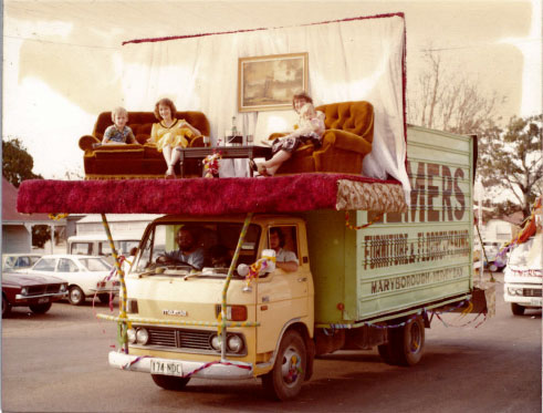 Many of the family were commandeered to sit precariously atop the often madcap floats.